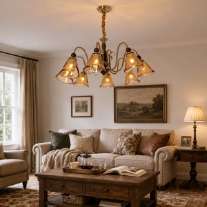 8-light walnut vintage cut glass chandelier above a living room seating area