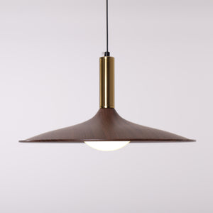 walnut double pendant light hung above a dining table