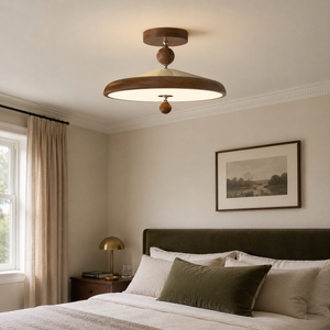 walnut two globe ceiling light in a bedroom with soft neutral decor
