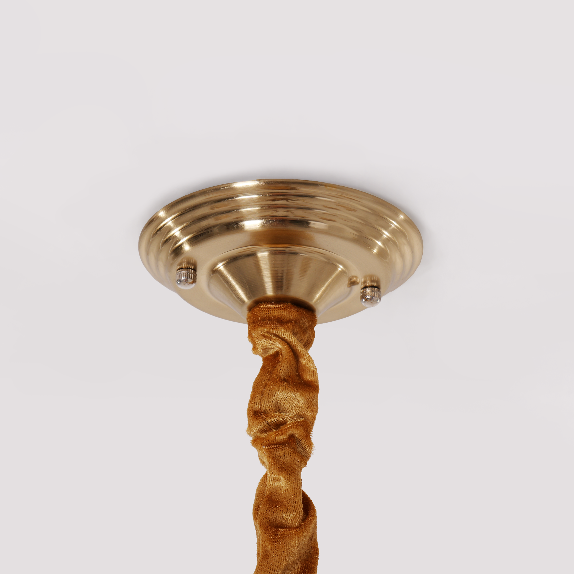 8-light walnut chandelier with amber cut glass shades brightening a traditional dining room