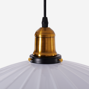 white iron pendant light beside a cosy seating area