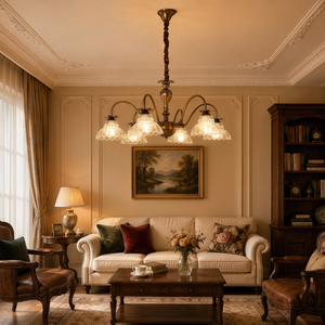 gold 6-light floral glass chandelier brightening a traditional dining room