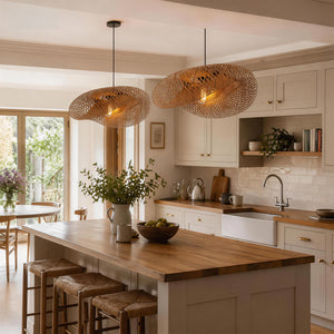pair of woven bamboo pendant lights over a bright kitchen island