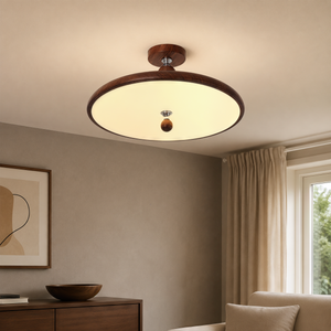 walnut two-globe flush ceiling light adding warm light to a bedroom
