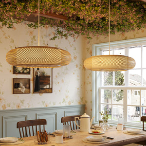 pair of bamboo rattan pendant lights in a dining room