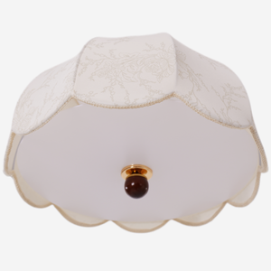 yellow fabric pendant light styled in a calm bedroom