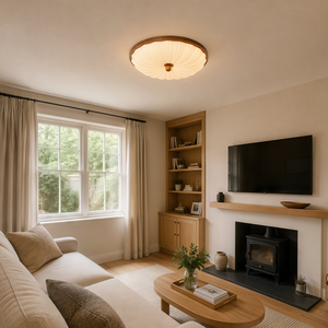walnut scalloped acrylic ceiling light brightening a living room