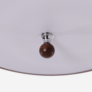 walnut two-globe flush ceiling light with a warm diffused glow