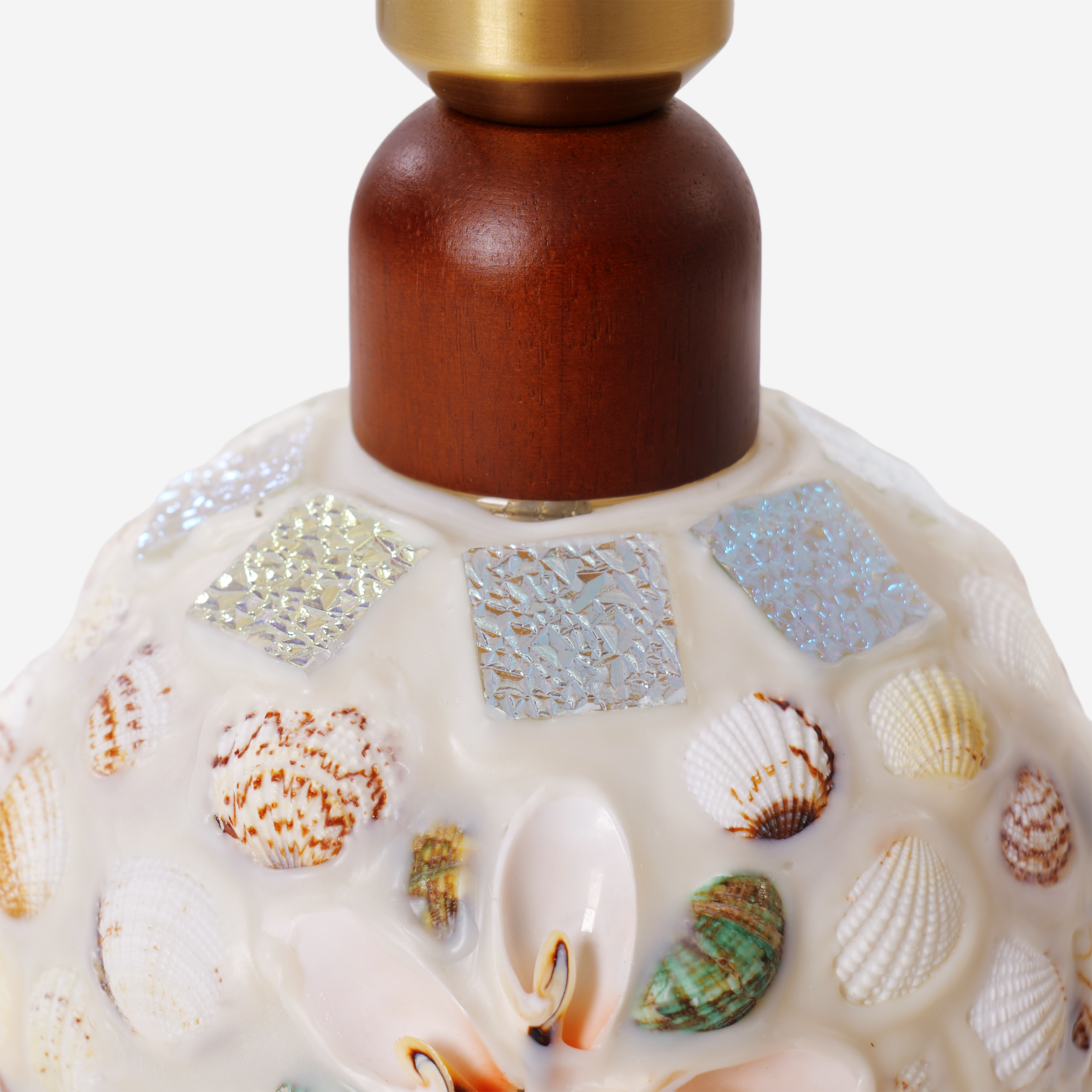 seashell mosaic table lamp styled on a small side table