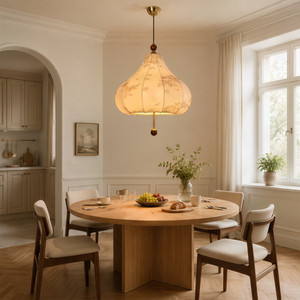 yellow floral fabric pendant light beside a cosy seating area