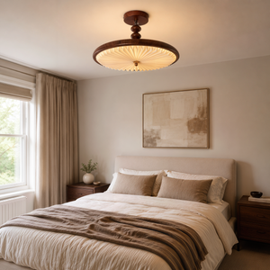 walnut pleated flush ceiling light shown as a clean product view