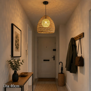 50cm rattan pendant light with yellow inner sphere above a dining table