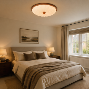 walnut scalloped acrylic ceiling light adding warm light to a bedroom