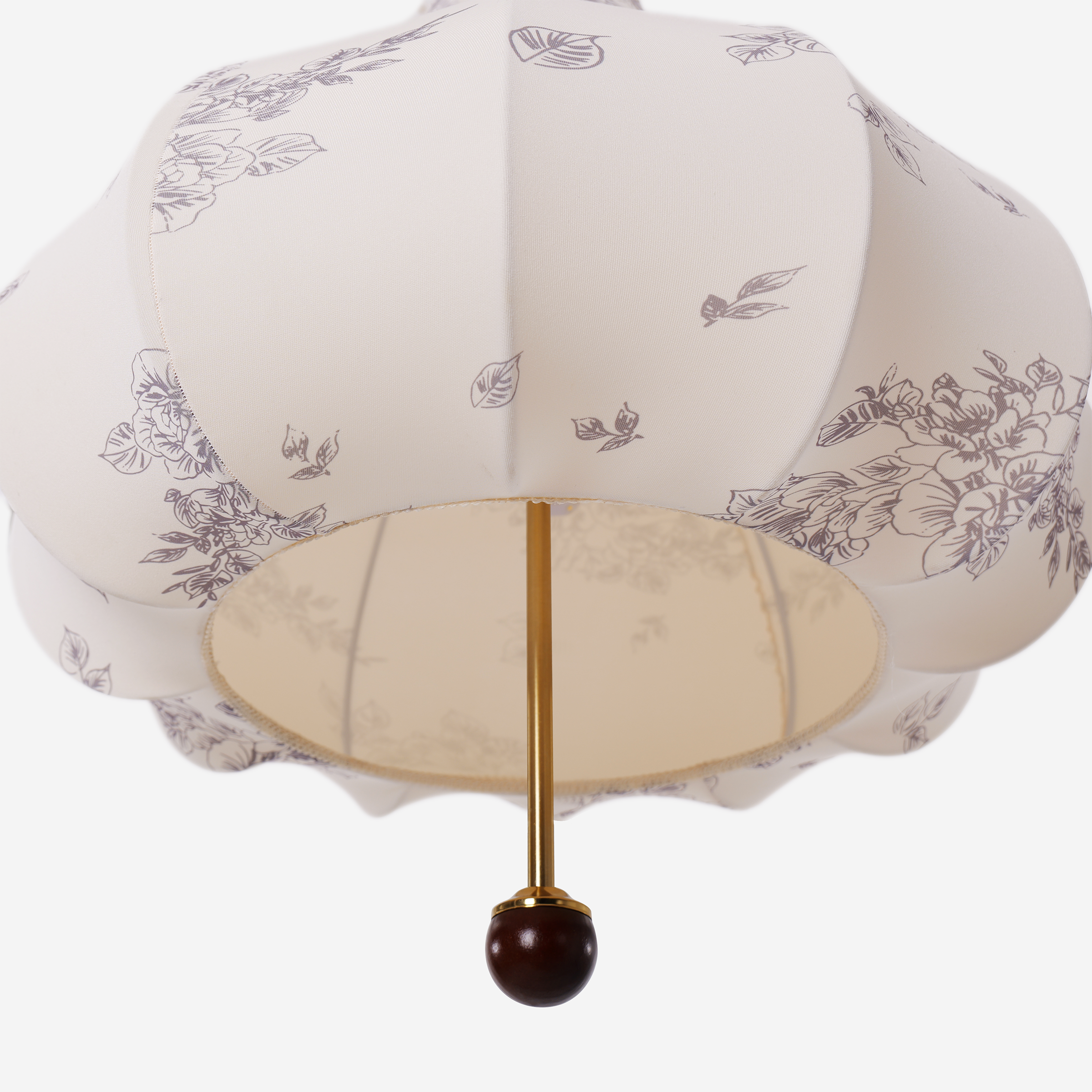 yellow floral fabric pendant light over a kitchen island