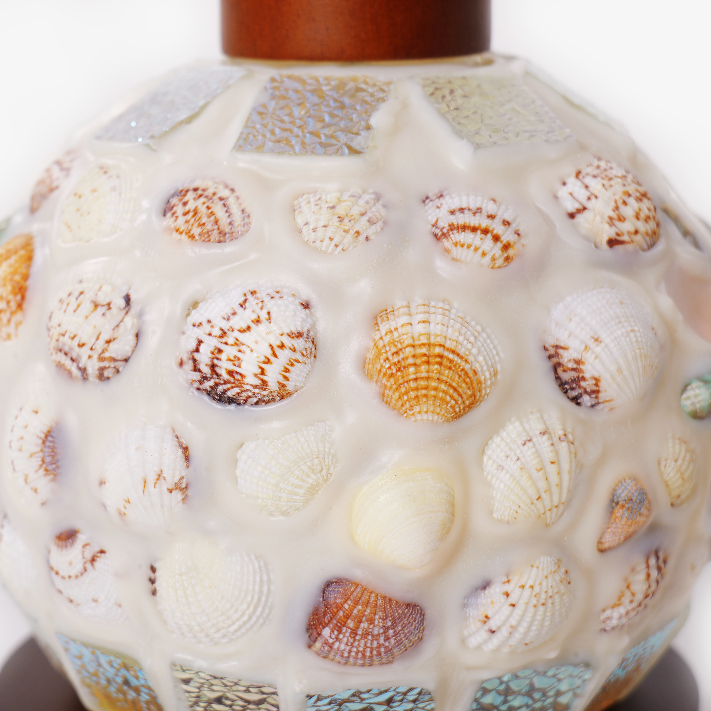 seashell mosaic table lamp with a warm diffused glow