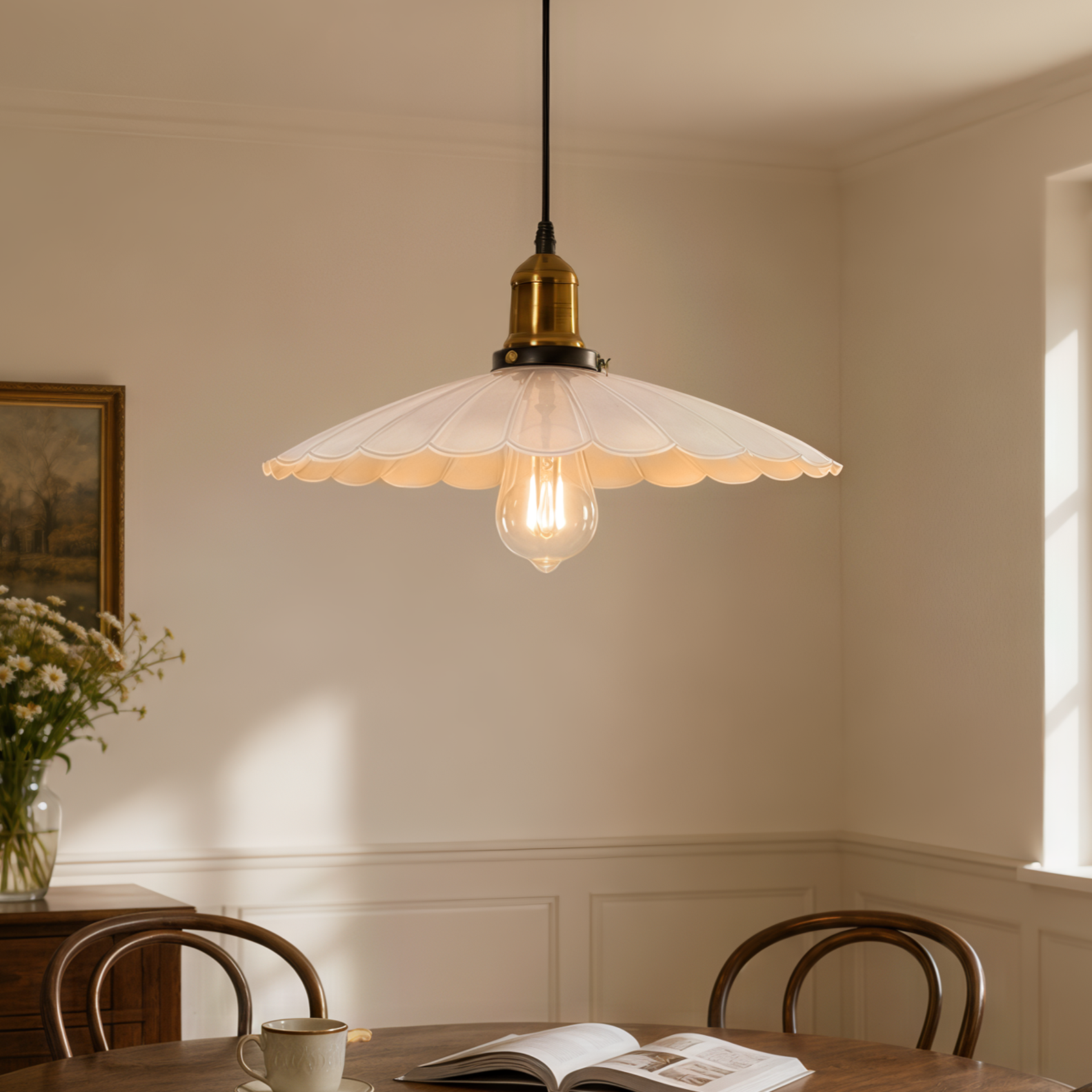 white iron pendant light hung above a dining table