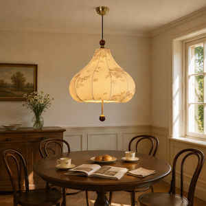 yellow floral fabric pendant light adding warm light to a dining space