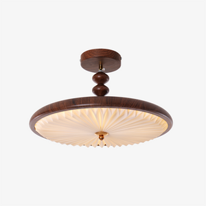 walnut pleated flush ceiling light adding warm light to a bedroom