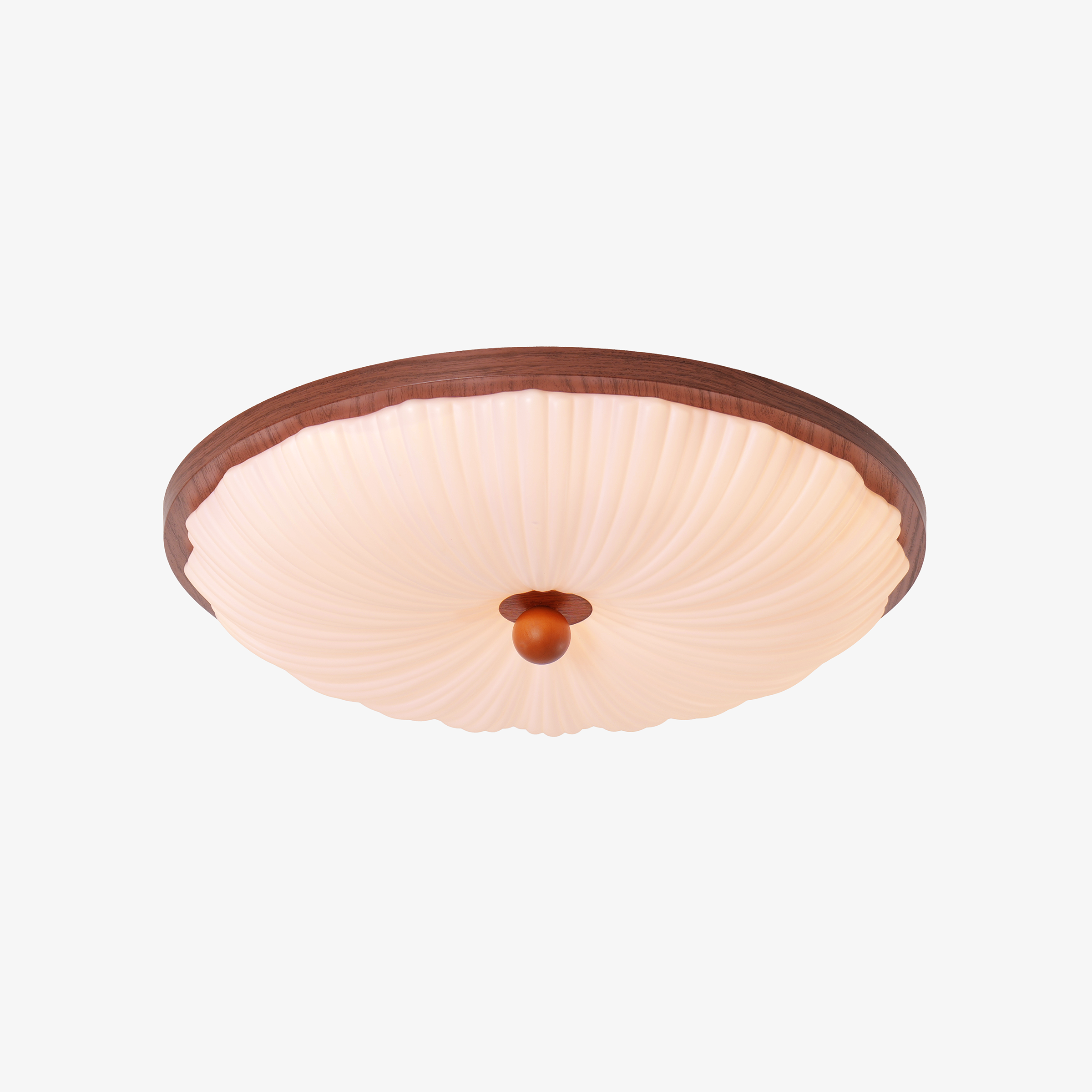 walnut scalloped acrylic ceiling light adding warm light to a bedroom