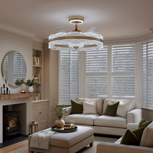 Cool white acrylic fan light in living room with bay window