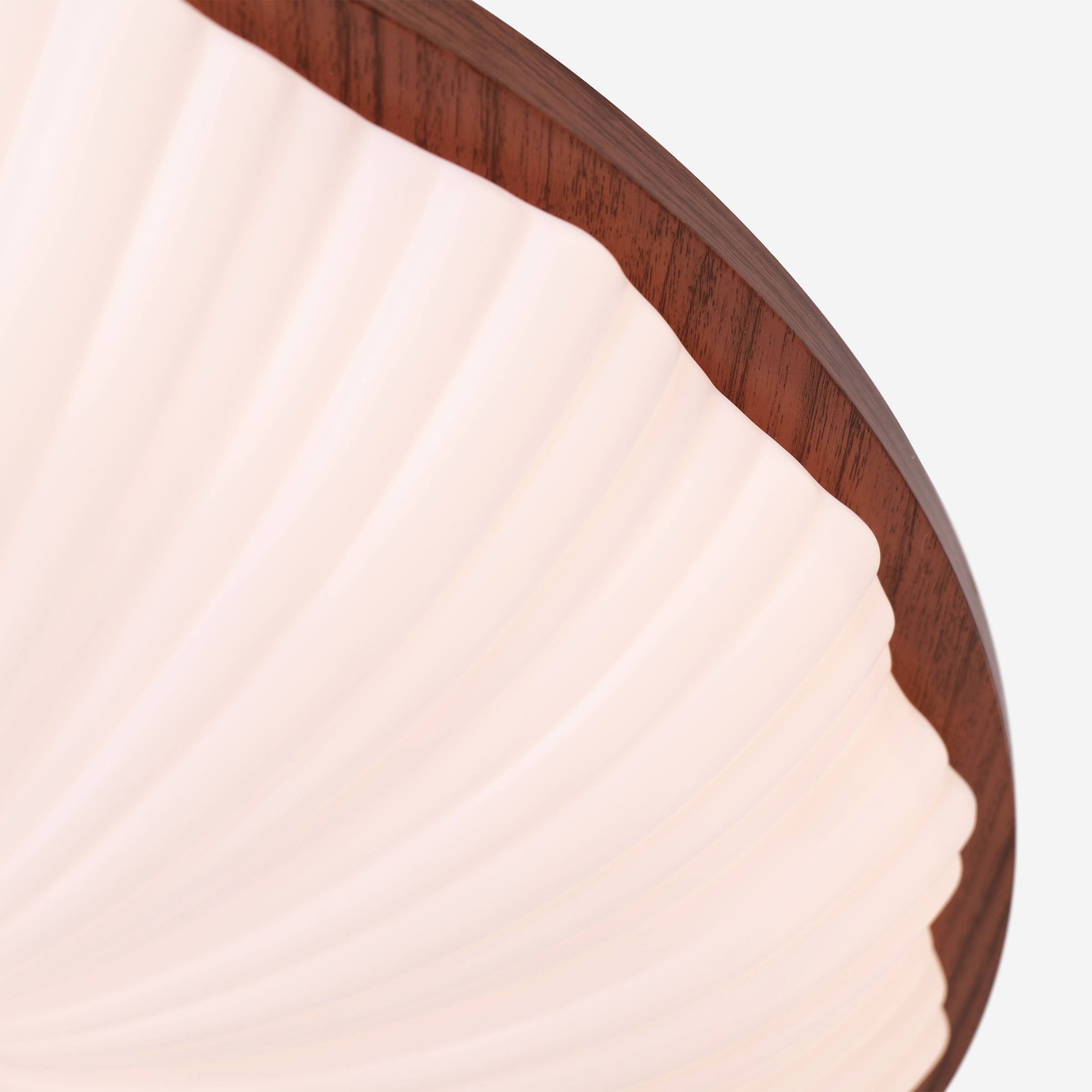 walnut scalloped acrylic ceiling light with a warm diffused glow
