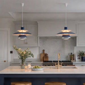 blue layered minimalist pendant light shown as a clean product view