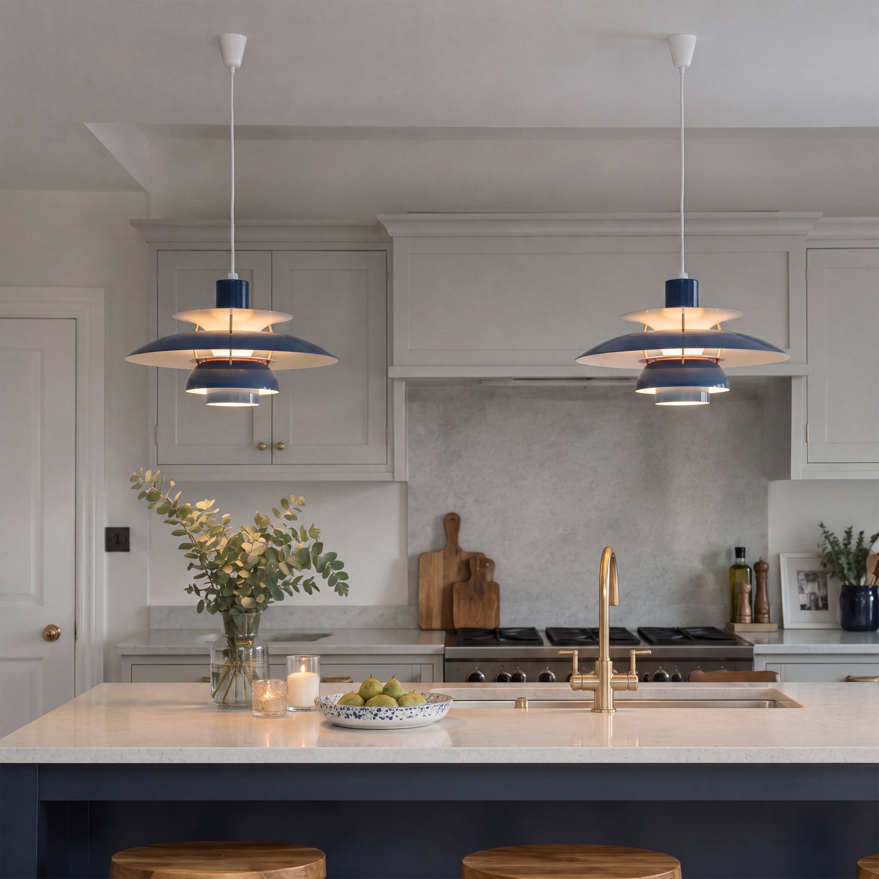 blue layered minimalist pendant light shown as a clean product view