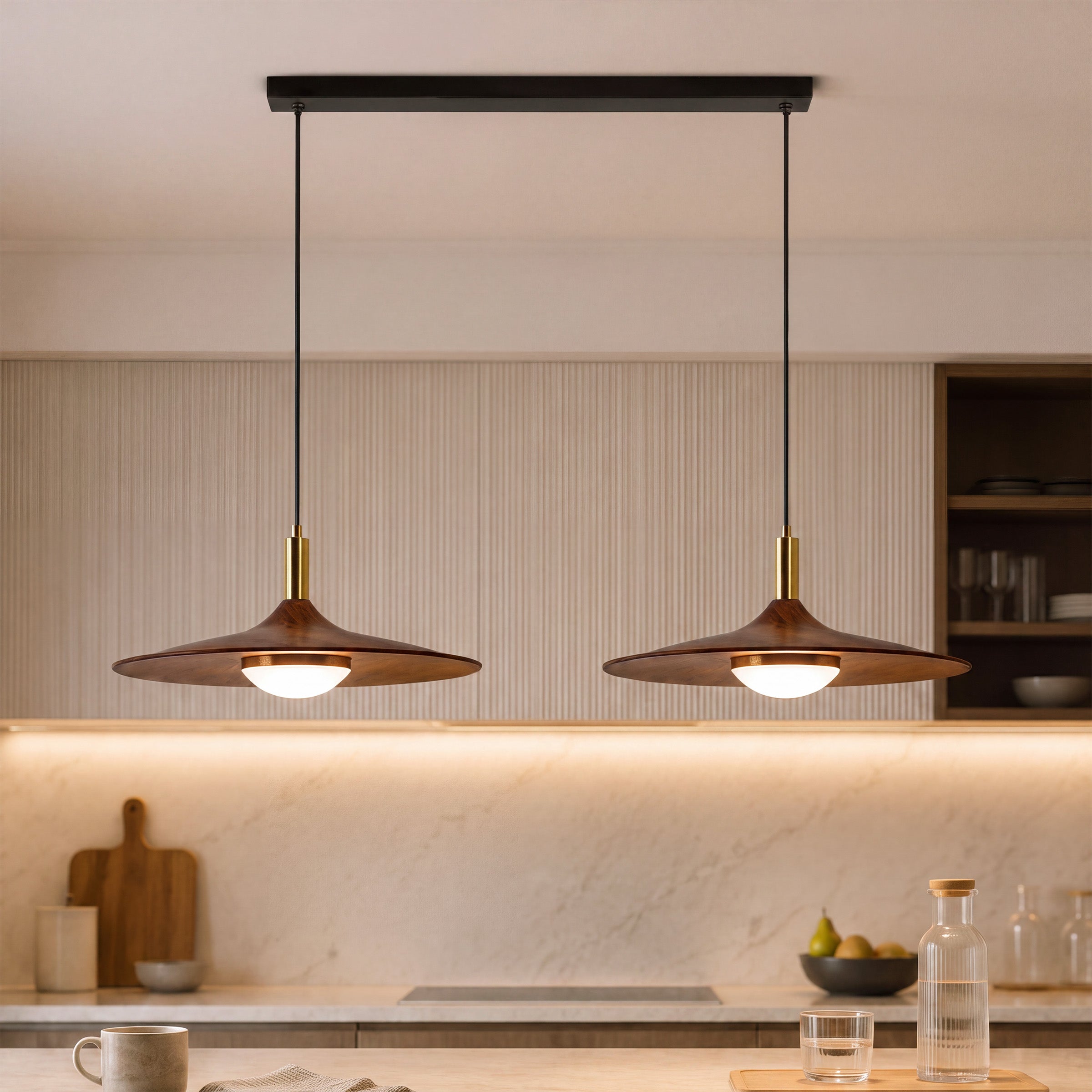 walnut double pendant light hung above a dining table
