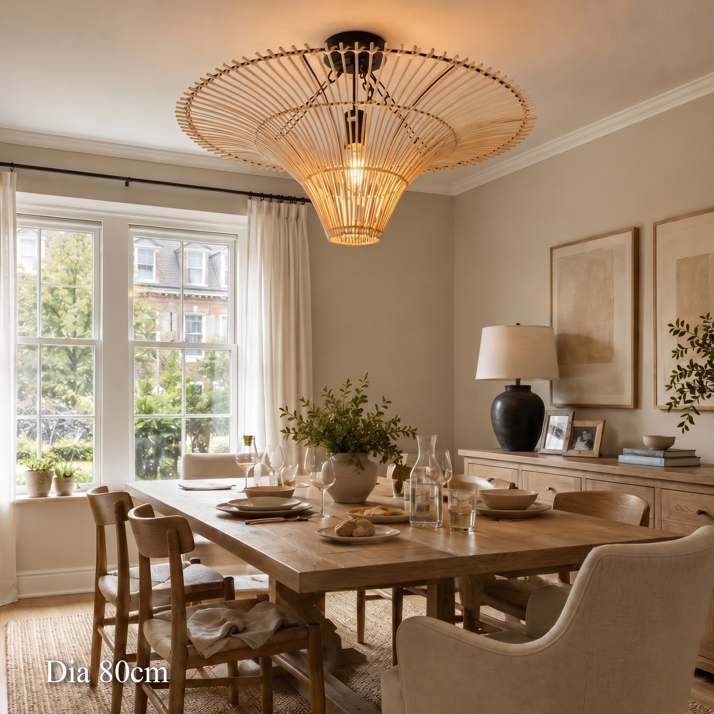 80cm rattan saucer ceiling light above a bright dining table and chairs