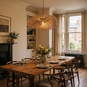 large woven bamboo pendant light in a bright dining room
