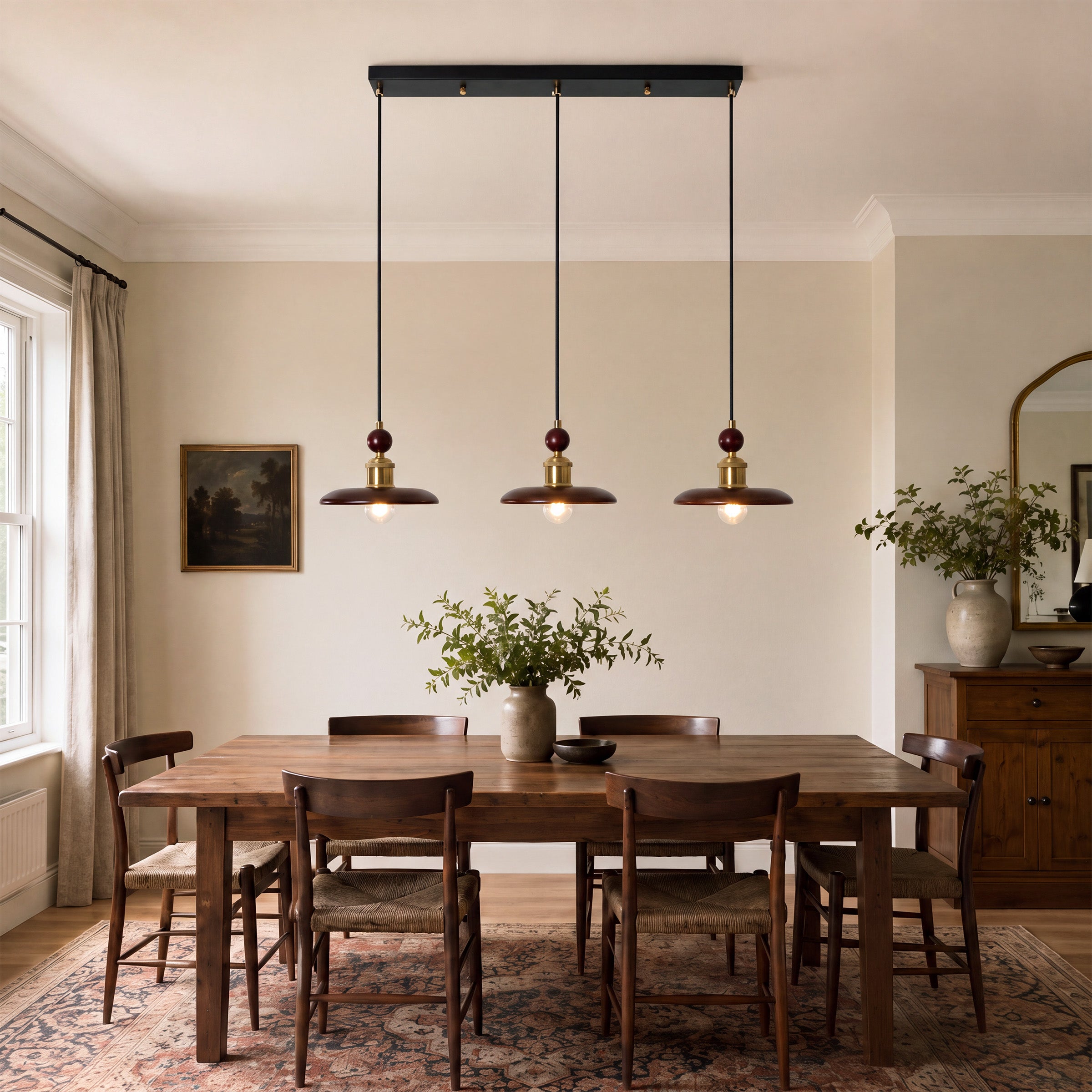 3-light walnut wood mini pendant beside a cosy seating area