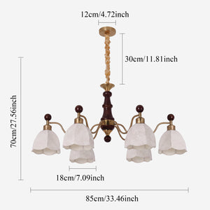 6-light chandelier with yellow fabric shades with close-up glass flower detail