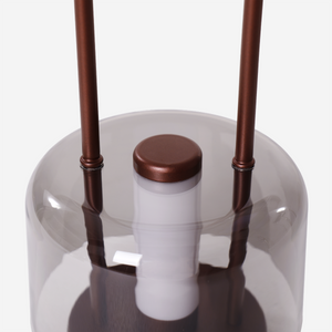 portable lantern-style ambient table lamp with a warm diffused glow