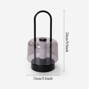 portable lantern-style ambient table lamp with a warm diffused glow