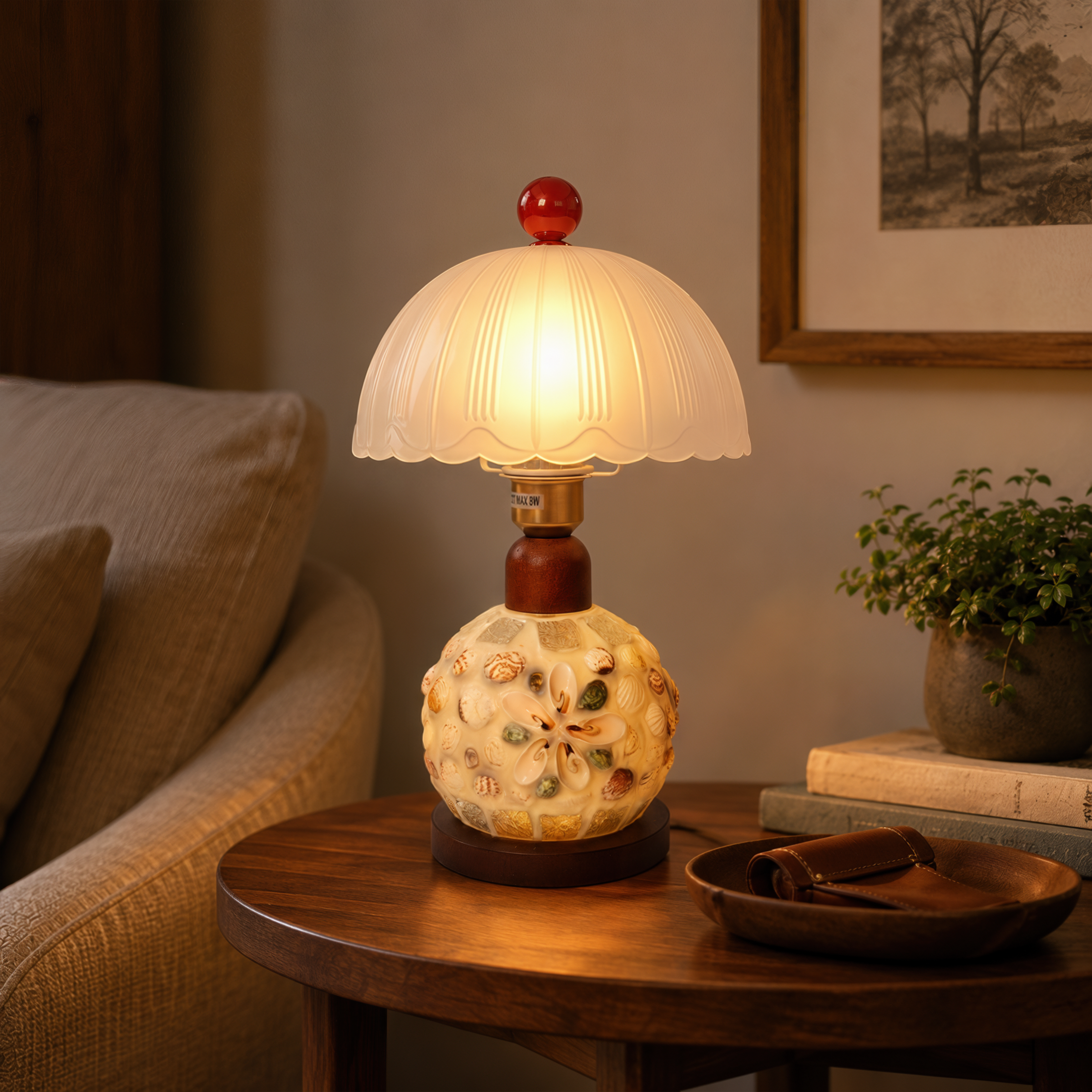 seashell mosaic table lamp shown as a clean product view