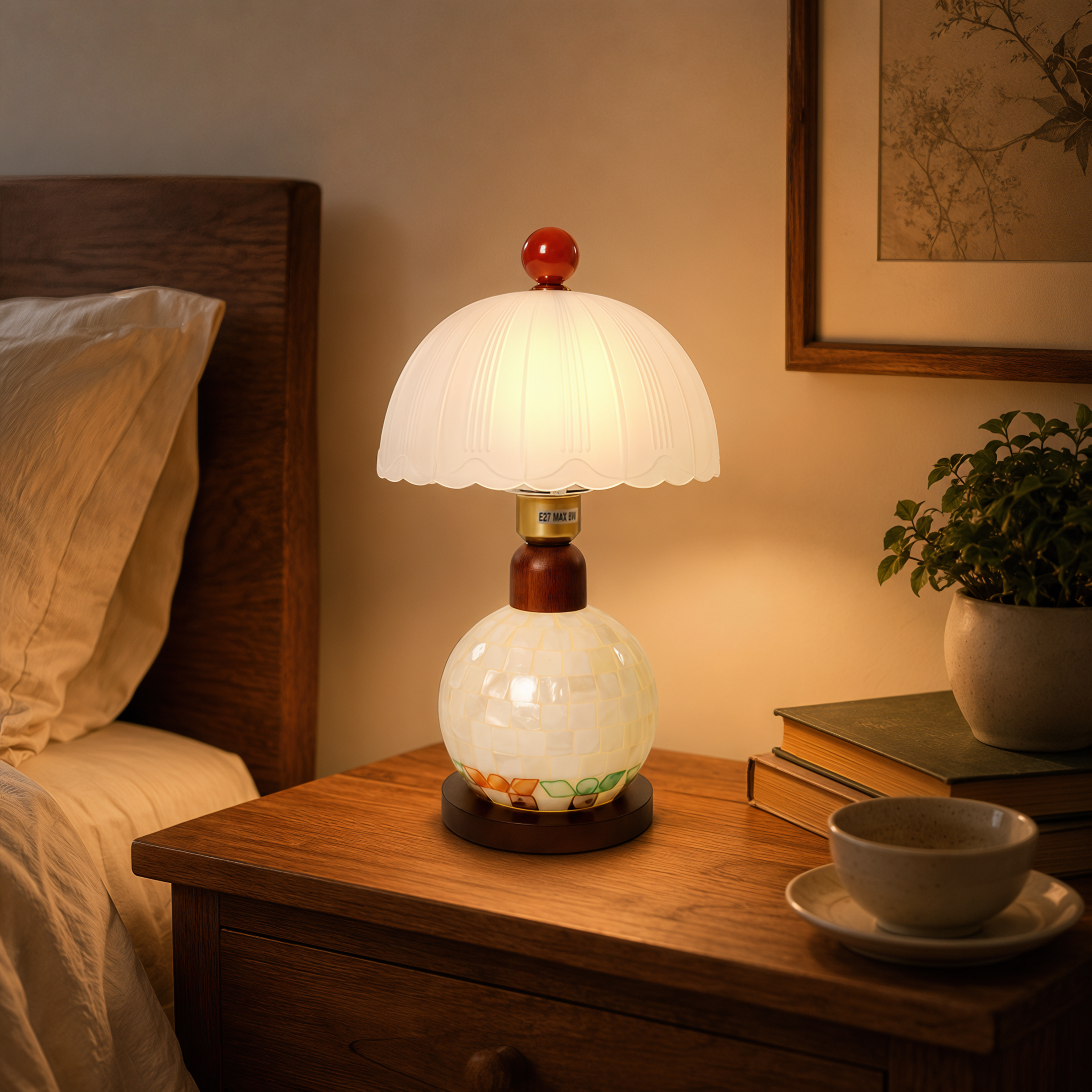 mother-of-pearl mosaic table lamp on a desk with soft ambient light