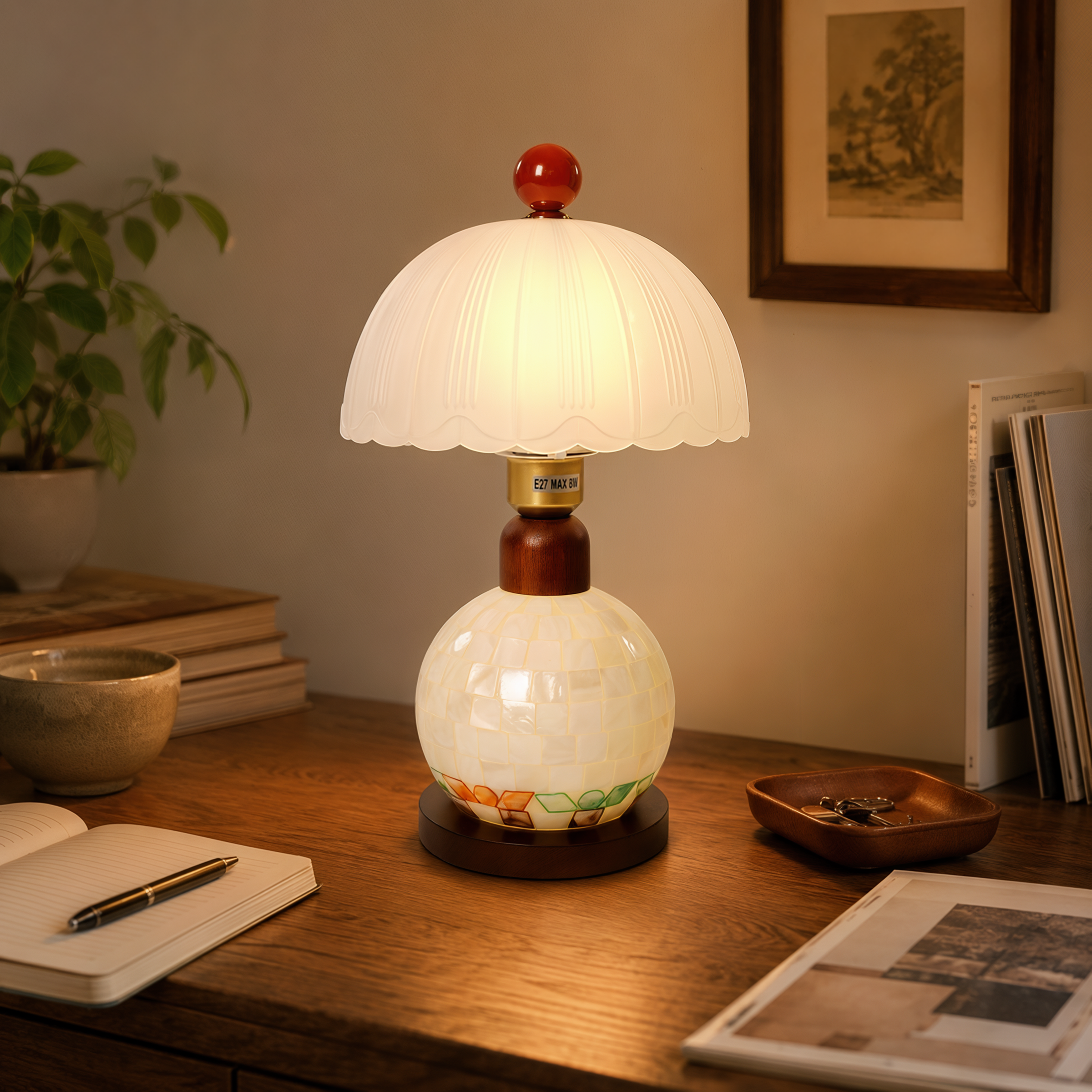 mother-of-pearl mosaic table lamp glowing on a bedside table