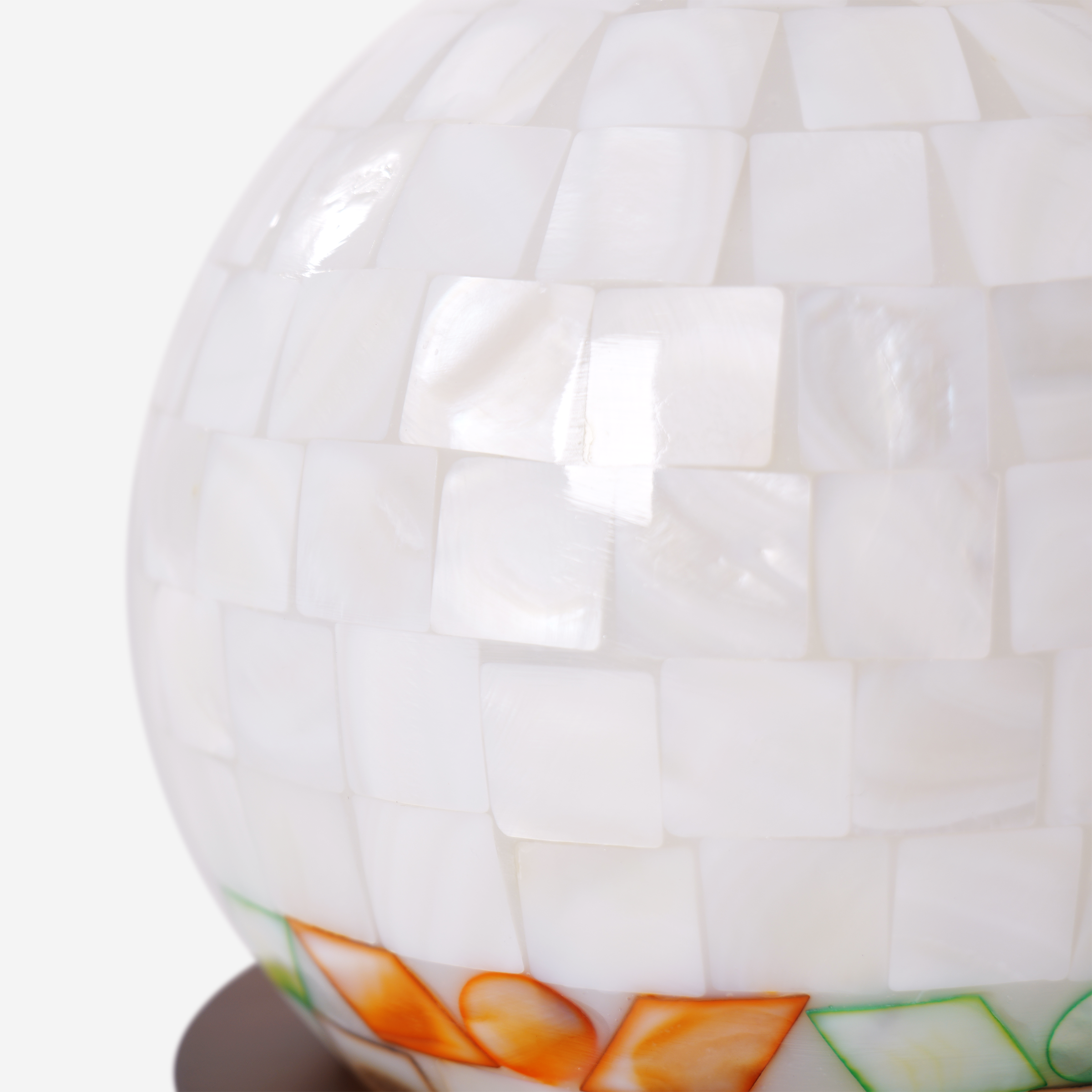 mother-of-pearl mosaic table lamp with a warm diffused glow