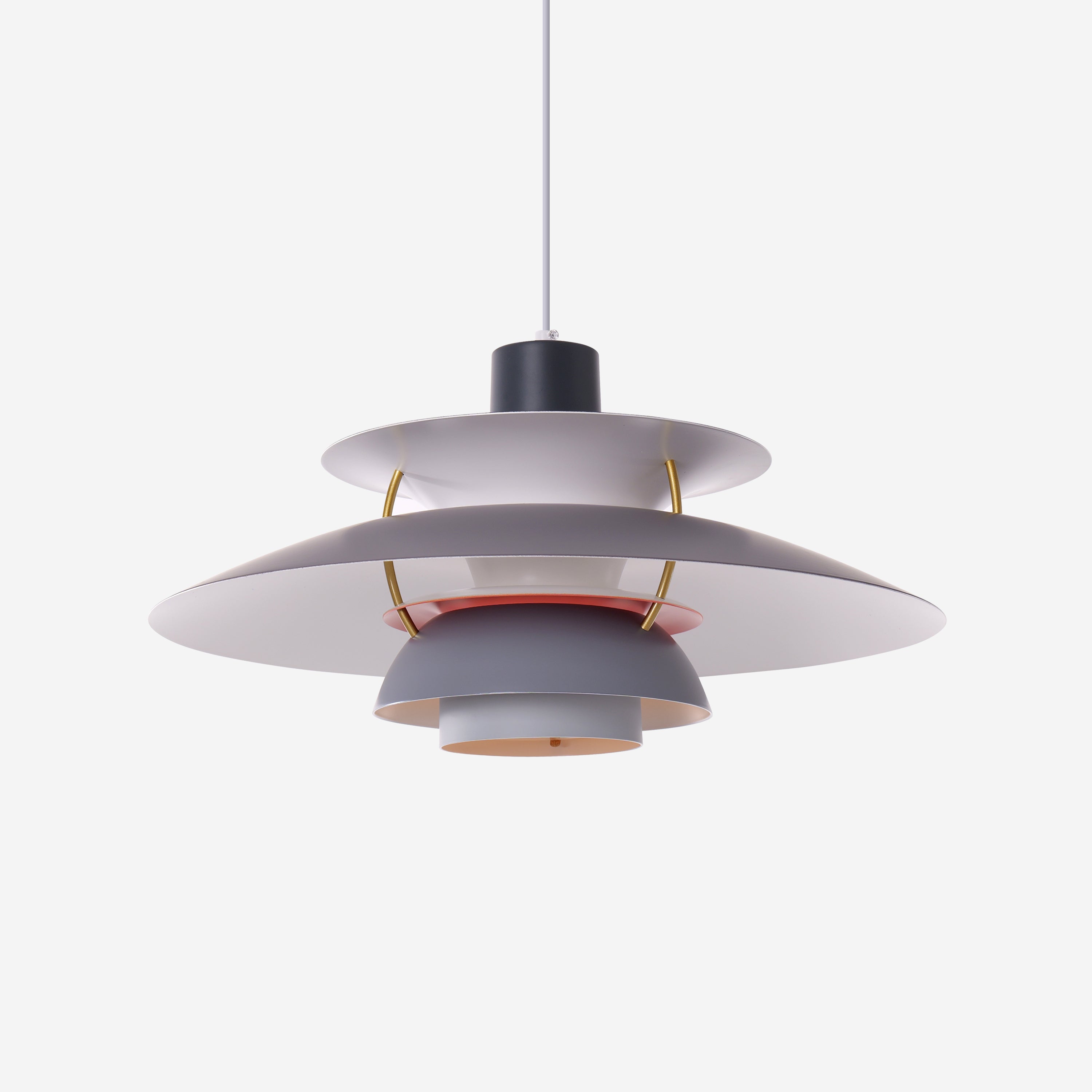 white layered minimalist pendant light over a kitchen island