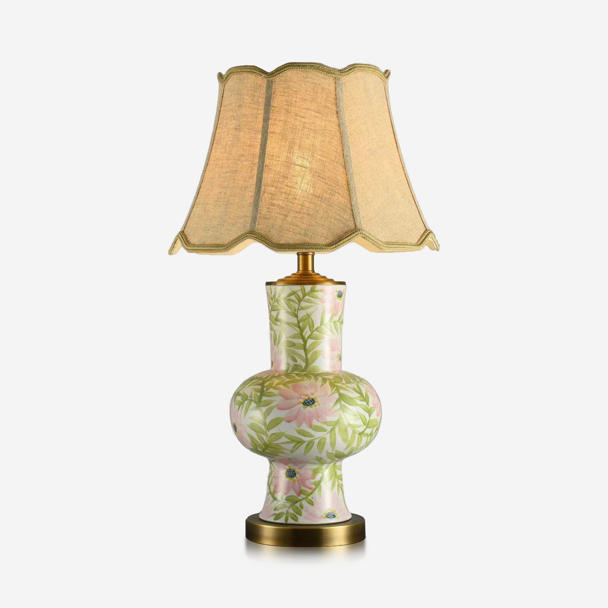 Slim floral ceramic table lamp with scalloped cream fabric shade
