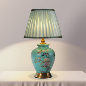 Turquoise Chinoiserie Hand-Painted Ceramic Table Lamp table lamp shown lit with warm