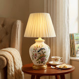 White Chinoiserie Hand-Painted Ceramic Table Lamp table lamp in a home interior