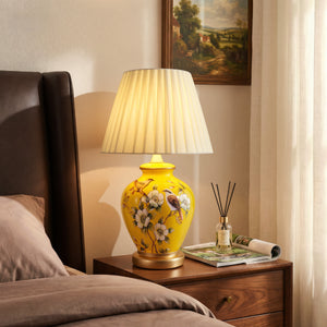 Yellow-Double Bird Chinoiserie Hand-Painted Ceramic Table Lamp table lamp on a bedroom bedside