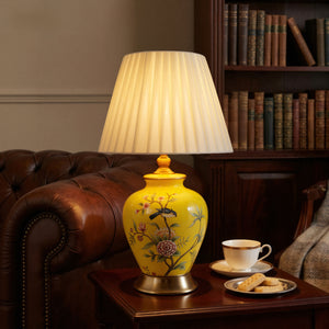 Yellow-Single Bird Chinoiserie Hand-Painted Ceramic Table Lamp table lamp in a home interior