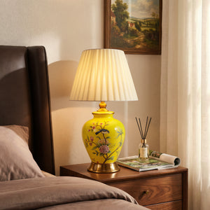 Yellow-Single Bird Chinoiserie Hand-Painted Ceramic Table Lamp table lamp on a bedroom bedside
