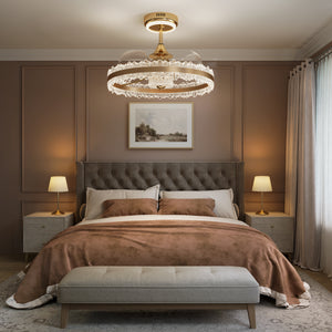 Gold halo fan light in neutral white over an upholstered bed and bench