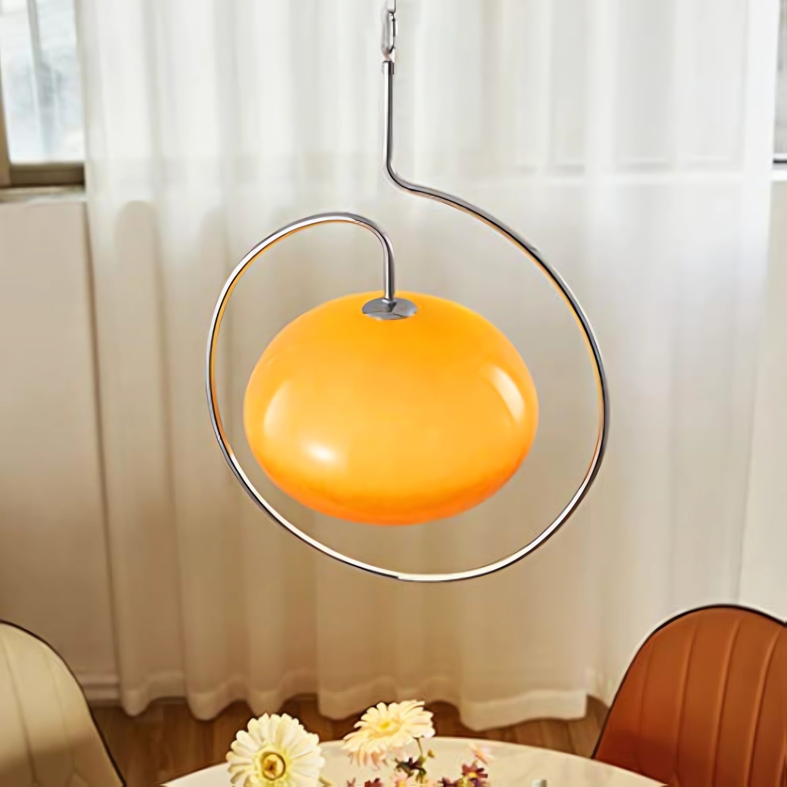 Sculptural Orange Glass Pendant Light with Curved Metal Frame